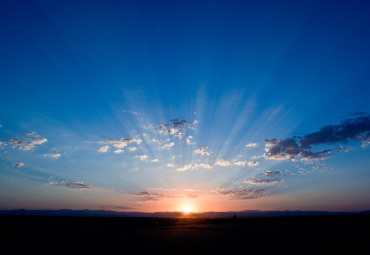 orange sunrise over flat land